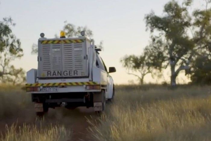 Ranger Ute in the outback driving into the sunset 