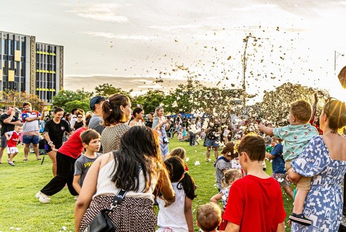 Families looking at bubbles
