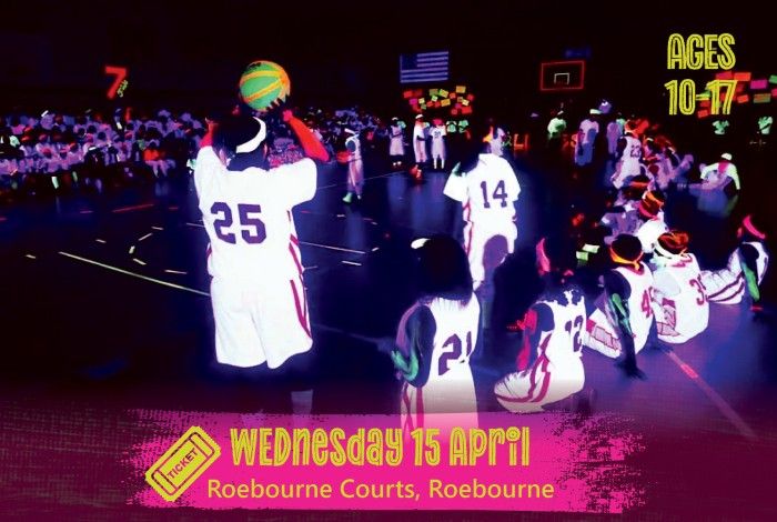 Young people wearing basketball jerseys play a glow-in-the-dark basketball game under blacklights in a gym. A pink banner reads “Wednesday 15 April – Roebourne Courts, Roebourne,” and text on the right says “Ages 10–17.”